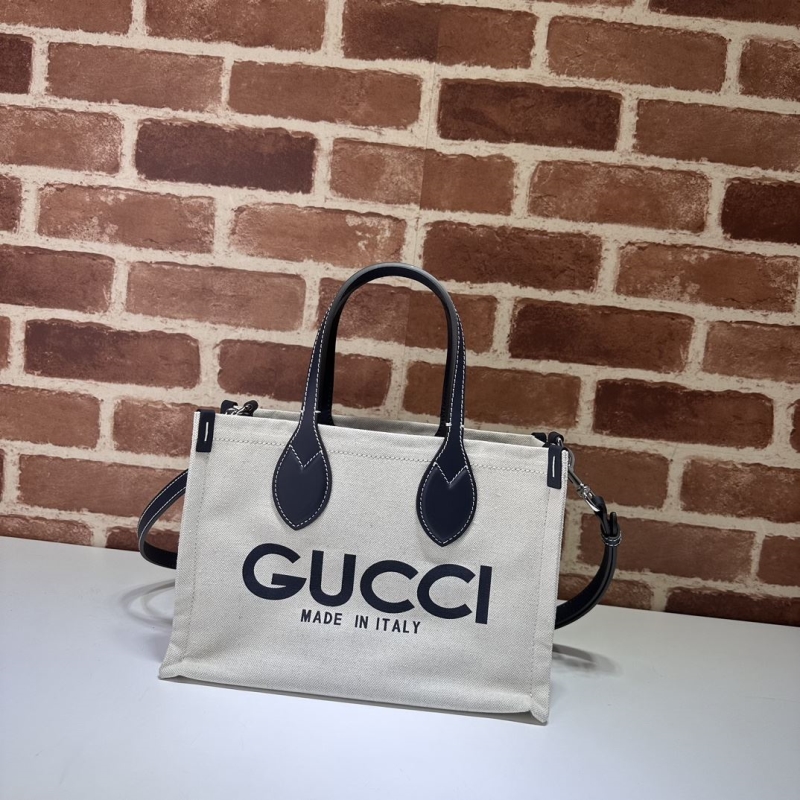 G*u*i shopping bags